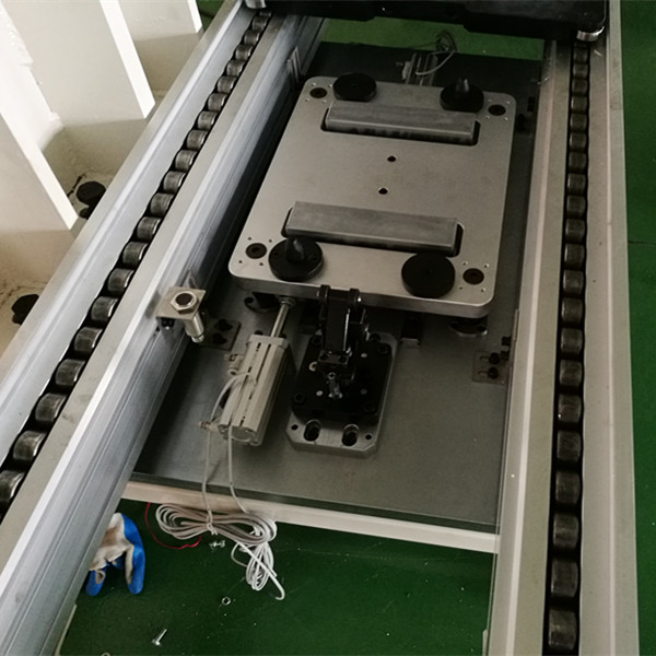 pallet conveyor system for automatic transfer system module assembly